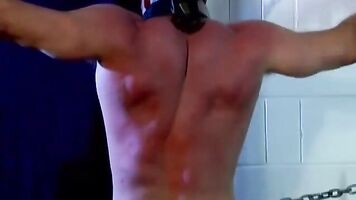 Fit guy gets bound with chains and has his back whipped