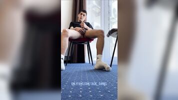 A GUY WITH HAIRY LEGS IN WHITE SOCKS ADIDAS JERKS OFF A DICK